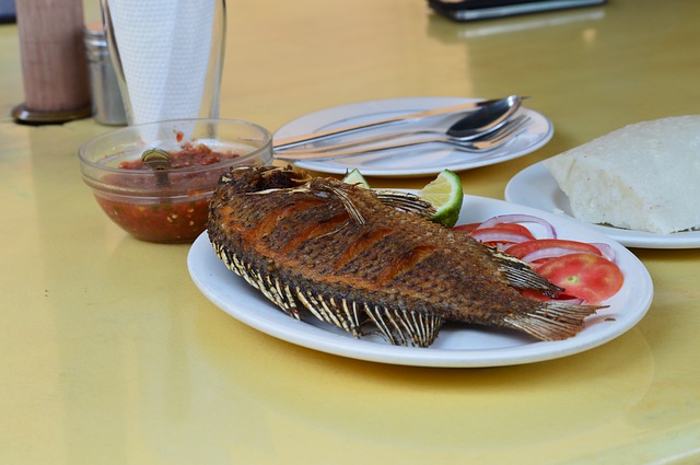 Fried tilapia served on a plate
Source: https://pixabay.com/photos/fried-fish-kenyan-food-2917852/